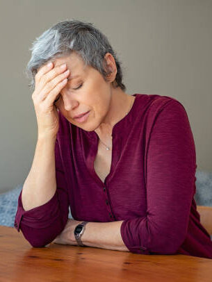 Image of a dietitian holding a stack of papers in hand which are test results.