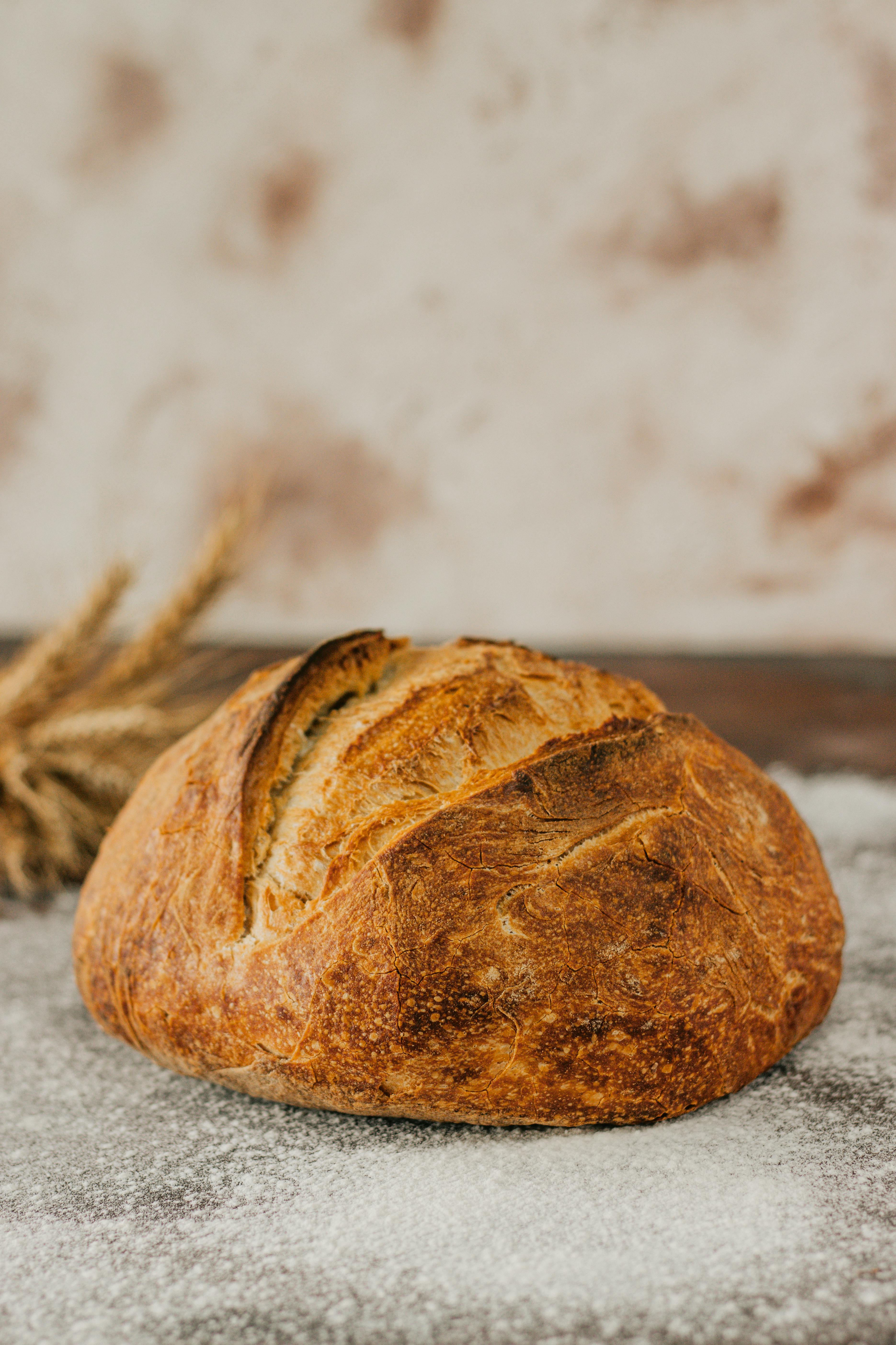 Image of an antimicrobial sitting on a table. image of sourdough bread.